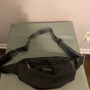 Guess brand hip purse. Leather like material.